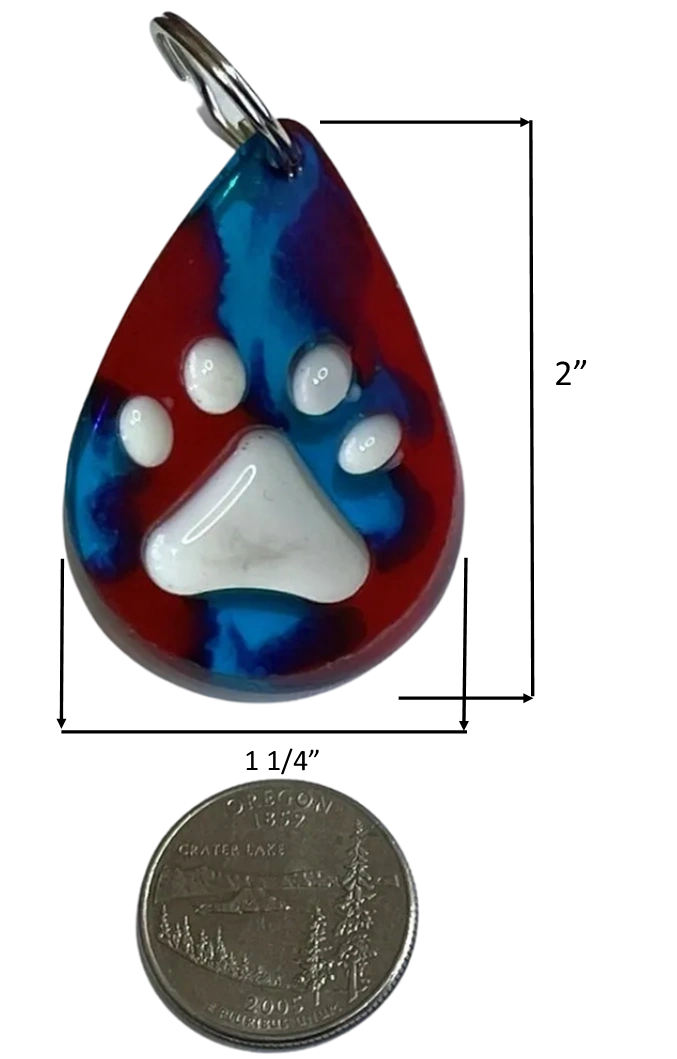 Handmade water drop-shaped charm with embossed paw